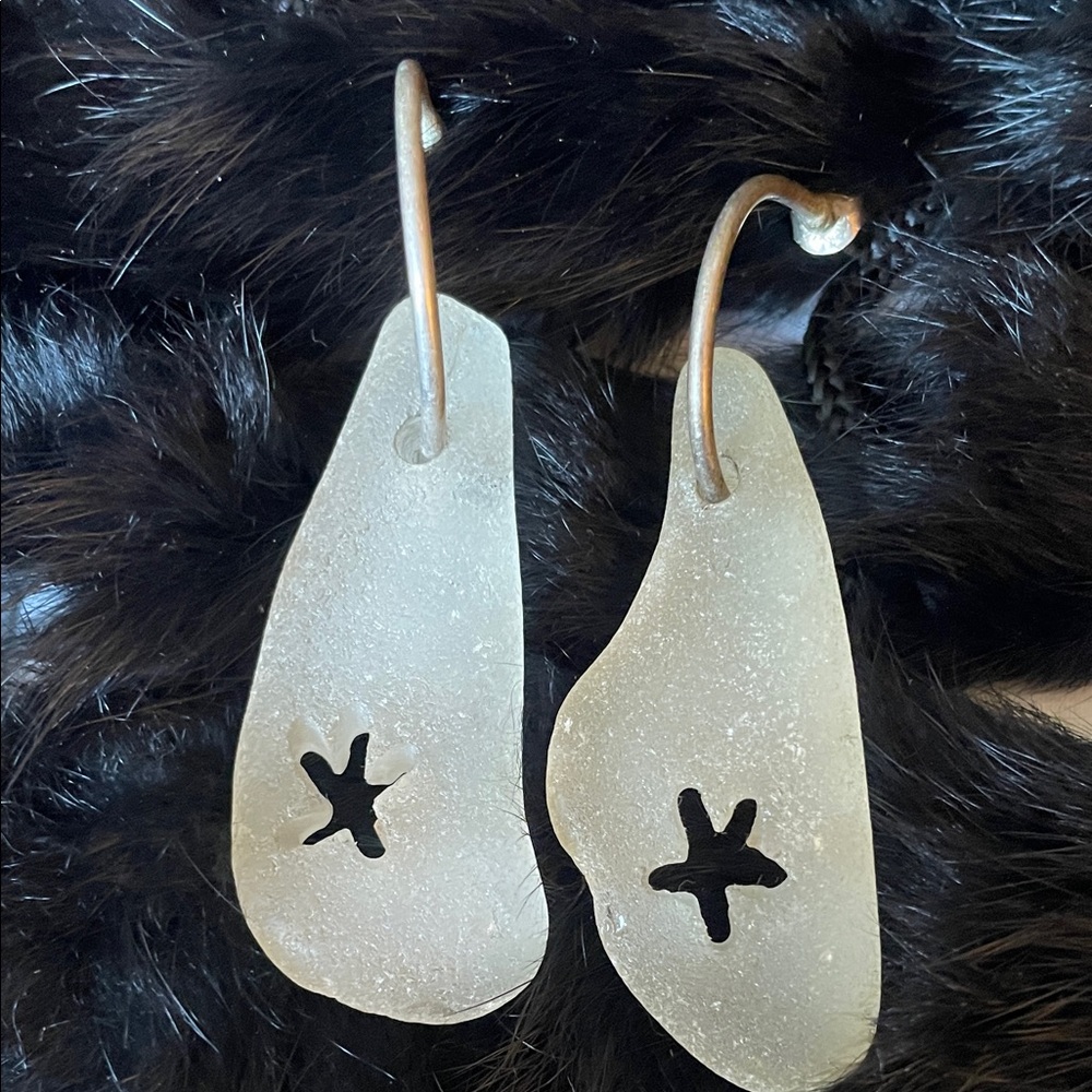 Unique Seaglass earrings with starfish cut into them